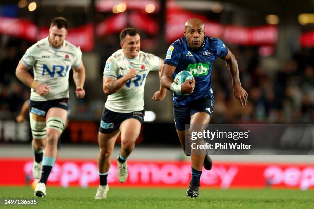 Mark Telea of the Blues runs in for a try during the Super Rugby Pacific Quarter Final match between Blues and Waratahs at Eden Park, on June 09 in...