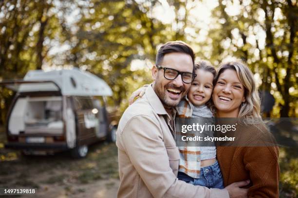 portrait of happy family in autumn day at trailer park. - outdoors photos 個照片及圖片檔