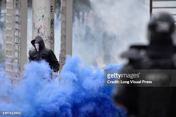 Colombia's riot police clash with demonstrators at Bogota's 'Universidad Nacional' during the day of the fallen student, june 8, 2023. Clashes...