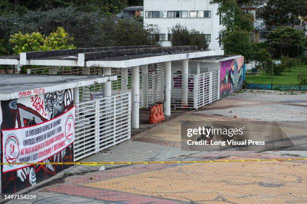 Colombia's forensic police and Anti-explosive police officers recover evidence after clashes between demonstrators and Colombia's Riot Police ended...