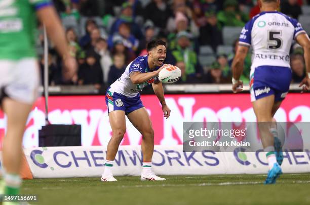 Shaun Johnson of the Warriors celebrates an intercept try during the round 15 NRL match between Canberra Raiders and New Zealand Warriors at GIO...