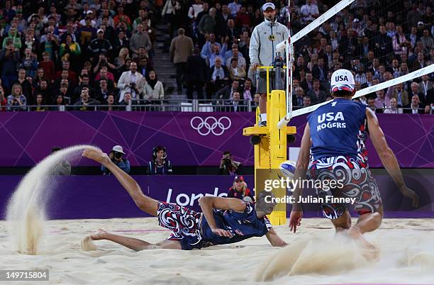 Todd Rogers and Phil Dalhausser of USA in action against Petr Benes and Premysl Kubala of Czech Republic during the Men's Beach Volleyball...