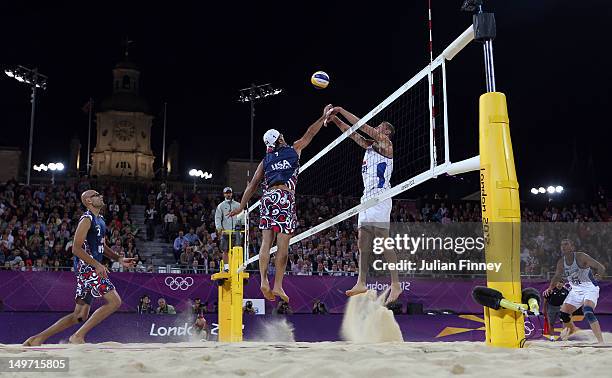 Todd Rogers and Phil Dalhausser of USA in action against Petr Benes and Premysl Kubala of Czech Republic during the Men's Beach Volleyball...