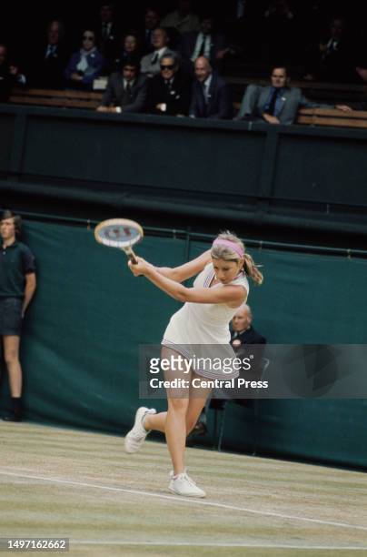 American tennis player Chris Evert plays a backhand during the Women's Singles tournament at Wimbledon, All England Lawn Tennis Club, London, 1975.