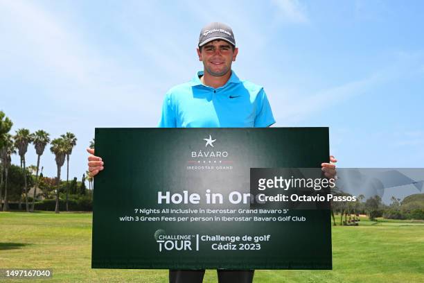 Casey Jarvis of South Africa with the hole in one prize on the 7th hole on Day Two of the Andalucia Challenge de Cadiz at Iberostar Real Golf Novo...