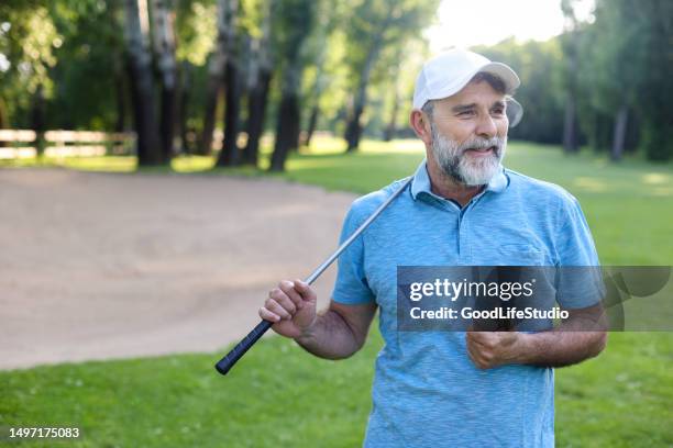male golf player - putting golf stock pictures, royalty-free photos & images