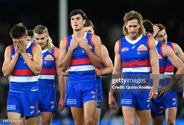 The Bulldogs look dejected after losing the round 13 AFL match between Western Bulldogs and Port Adelaide Power at Marvel Stadium, on June 09 in...