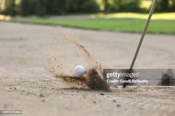 golf ball in a sand trap - golf bunker stock pictures, royalty-free photos & images
