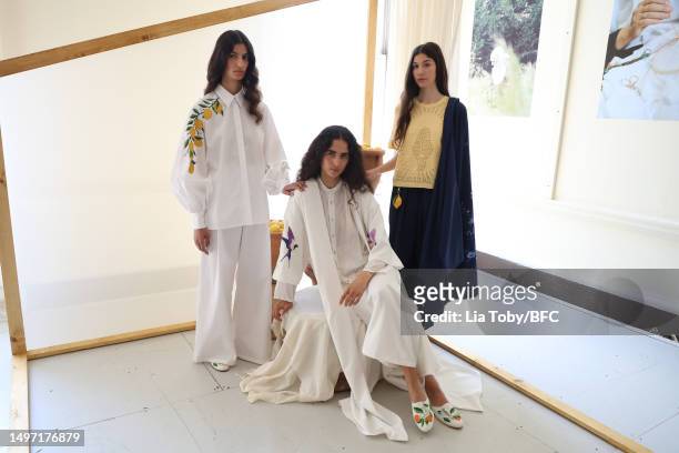 Model poses during the Qasimi/Qasimi Rising Presents: Omer Asim, Salim Azzam presentation during London Fashion Week June 2023 on June 09, 2023 in...