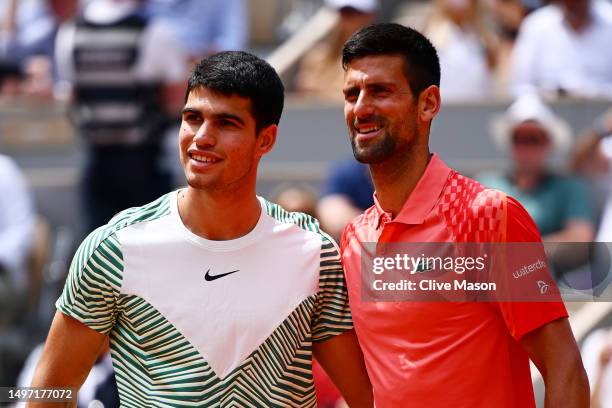 Carlos Alcaraz of Spain and Novak Djokovic of Serbia pose for a photograph ahead of the Men's Semi Final match on Day Thirteen of the 2023 French...