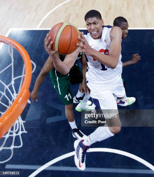 Anthony Davis of the United States scores against Nigeria during the Men's Basketball Preliminary Round match between Nigeria and the United States...