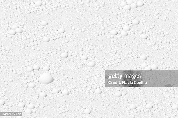 white background pattern with white spheres - holprig stock-fotos und bilder