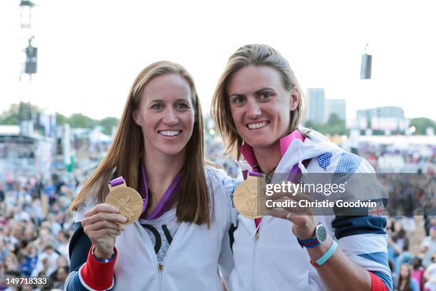 Helen Glover and Heather Stanning who won gold in the women's pairs rowing competition at the London 2012 Olympics pose on stage with their gold...