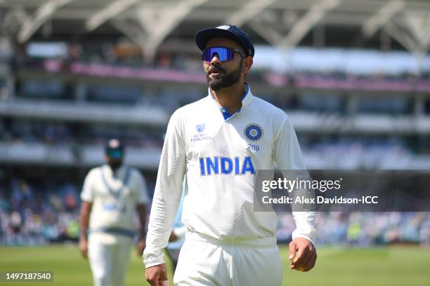 Virat Kohli of India looks on before fielding during day three of the ICC World Test Championship Final between Australia and India at The Oval on...