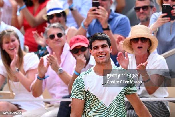 Carlos Alcaraz of Spain celebrates a point against Novak Djokovic of Serbia during the Men's Singles Semi Final match on Day Thirteen of the 2023...