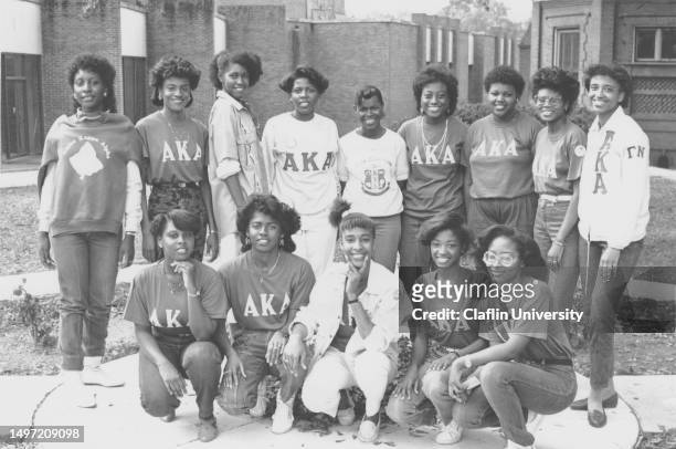 Alpha Kappa Alpha Sorority members wearing tee shirts with "AKA" photographed on campus at Claflin University in the 1980s.
