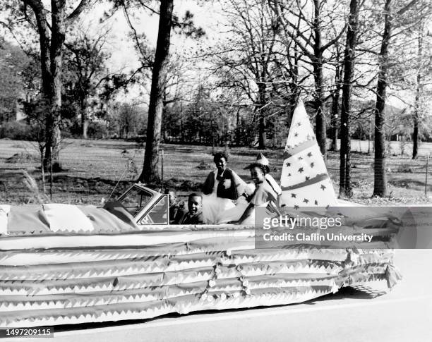 Students in a decorated car at a homecoming parade on the campus of Claflin University in Orangeburg, South Carolina.
