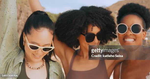 beach, women friends and sunglasses with a hug for love on vacation or holiday in summer. happy diversity people group for tropical time and travel adventure with eyewear in south africa - glases group nature stock pictures, royalty-free photos & images