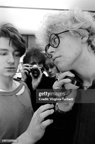 Larry Mullen, Adam Clayton, The Edge and Bono pose in a hotel lift, Netherlands, 17th October 1980.