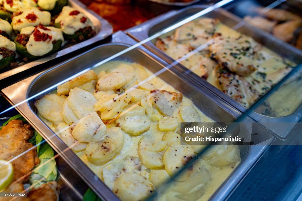 Close up of delicious variety of prepared foods at a deli