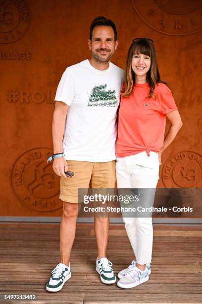 Christophe Michalak and Delphine McCarty attend the 2023 French Open at Roland Garros on June 09, 2023 in Paris, France.