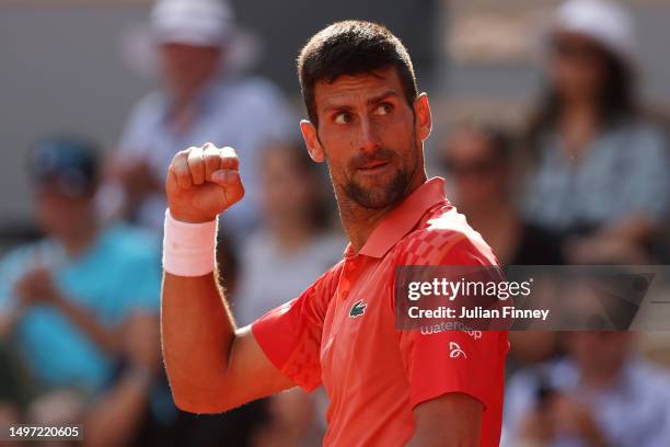 Novak Djokovic of Serbia celebrates winning match point against Carlos Alcaraz of Spain during the Men's Singles Semi Final match on Day Thirteen of...