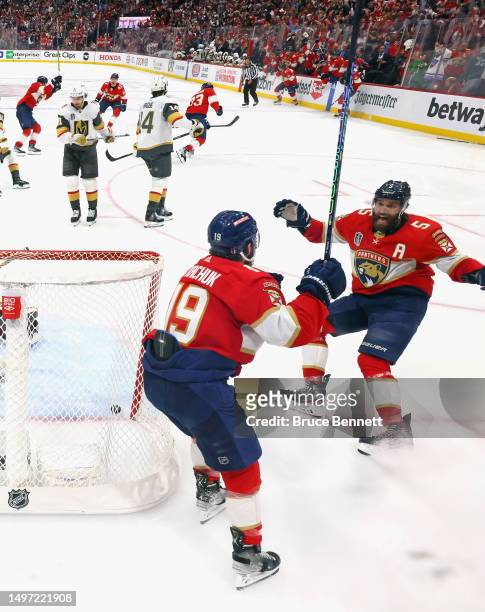 Matthew Tkachuk and Aaron Ekblad of the Florida Panthers celebrate the game winning goal against the Vegas Golden Knights in Game Three of the 2023...