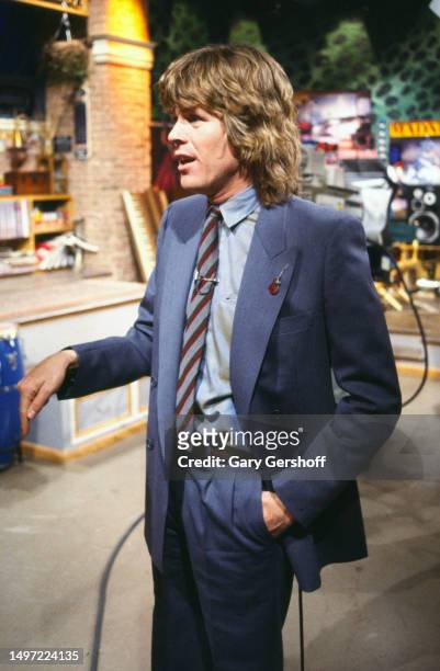 View of British Rock & Pop musician Peter Noone on set after an MTV interview at Teletronic Studios, New York, New York, April 21, 1982.