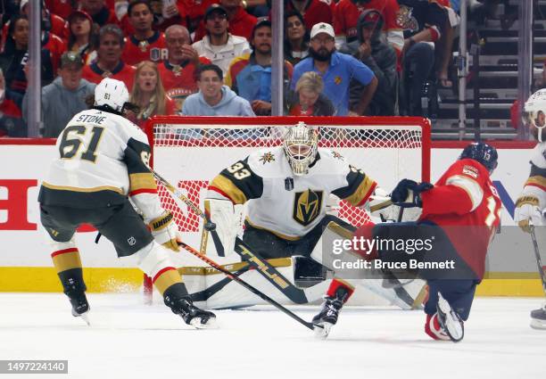 Adin Hill of the Vegas Golden Knights makes the save on Sam Reinhart of the Florida Panthers in Game Three of the 2023 NHL Stanley Cup Final at FLA...