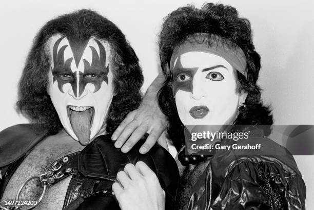 Portrait of Rock musicians Gene Simmons and Paul Stanley , both of the group Kiss, as they pose during a visit to the Cerebral Palsy Center, New...