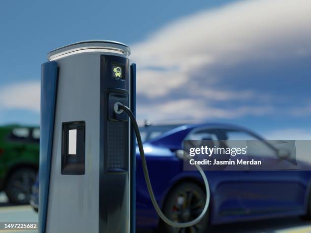 electric car recharging - vehículo híbrido fotografías e imágenes de stock