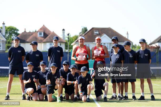 Women's Doubles Winners Yanina Wickmayer of Belgium and Sophie Chang of the USA pose with their trophies after the final in the Lexus Surbiton Trophy...