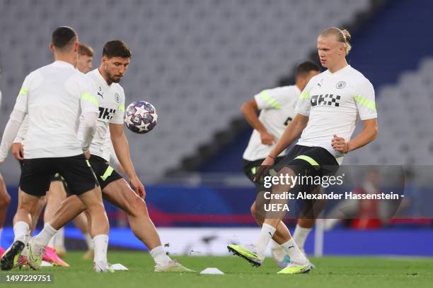 Erling Haaland of Manchester City passes the ball during the Manchester City Training Session ahead of the UEFA Champions League 2022/23 final on...