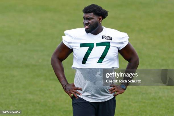 Tackle Mekhi Becton of the New York Jets works out on a side field during the teams OTAs at Atlantic Health Jets Training Center on June 9, 2023 in...