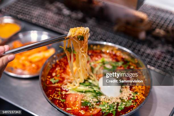 close-up of naengmyeon - korean culture stock pictures, royalty-free photos & images