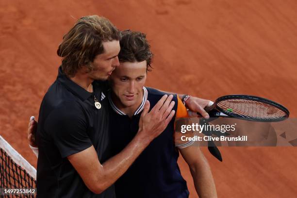 Alexander Zverev of Germany shakes hands with Casper Ruud of Norway after the Men's Singles Semi Final match on Day Thirteen of the 2023 French Open...