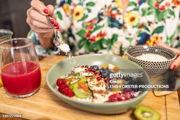 close up of healthy breakfast - superfood bowl with yogurt and fruits - yogurt stock pictures, royalty-free photos & images