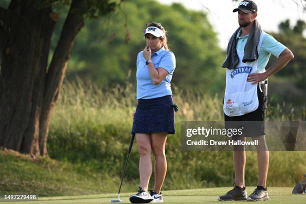 Gerina Mendoza of the United States waits to putt on the seventh green during the first round of the ShopRite LPGA Classic presented by Acer at...