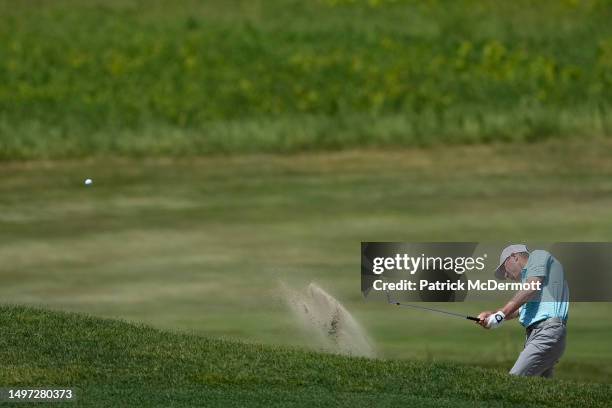 Steven Alker of New Zealand hits from a fairway bunker on the second hole during the first round of the American Family Insurance Championship at...