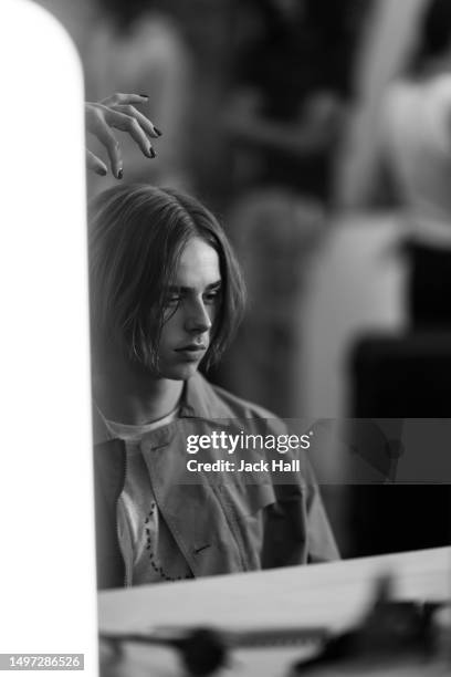 Model backstage ahead of the Justin Cassin Autumn/Winter 24 Show during London Fashion Week June 2023 on June 09, 2023 in London, England.