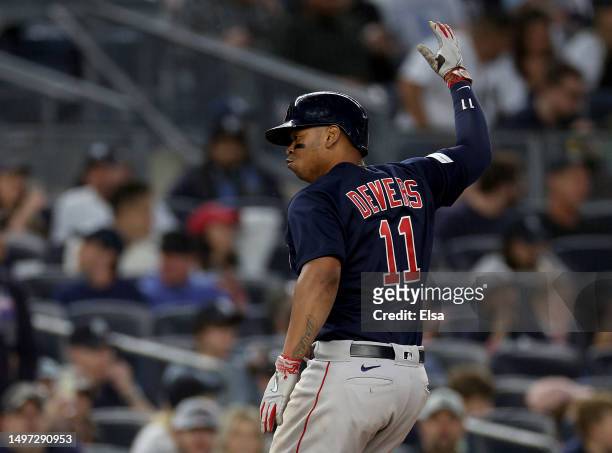 Rafael Devers of the Boston Red Sox celebrates his solo home run in the sixth inning against the New York Yankees at Yankee Stadium on June 9, 2023...