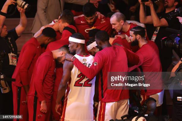 Miami Heat players huddle prior to Game Four of the 2023 NBA Finals against the Denver Nuggets at Kaseya Center on June 09, 2023 in Miami, Florida....