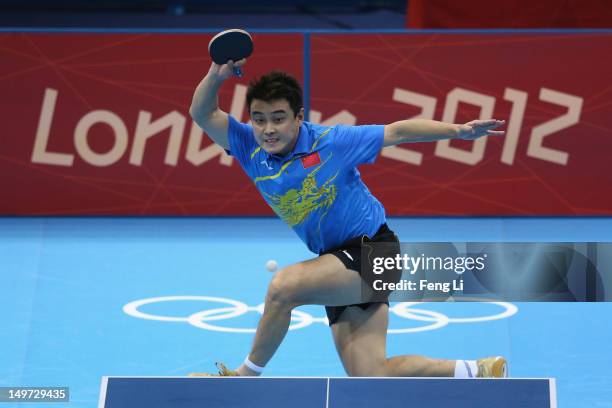 Wang Hao of China plays a shot during Men's Singles Table Tennis Gold medal match against Zhang Jike of China on Day 6 of the London 2012 Olympic...