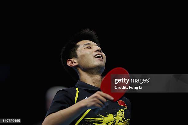 Zhang Jike of China celebrates during Men's Singles Table Tennis Gold medal match against Wang Hao of China on Day 6 of the London 2012 Olympic Games...