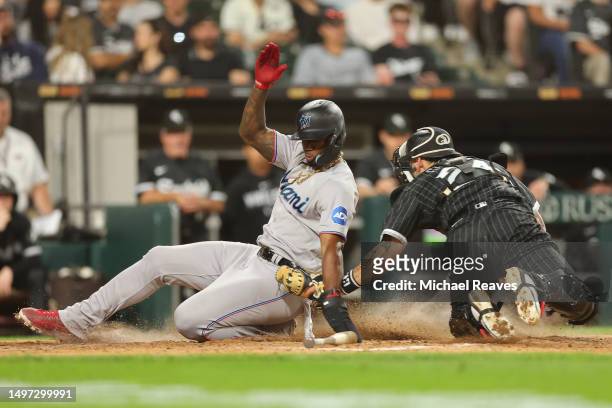 Yasmani Grandal of the Chicago White Sox tags out Jorge Soler of the Miami Marlins during the sixth inning at Guaranteed Rate Field on June 09, 2023...