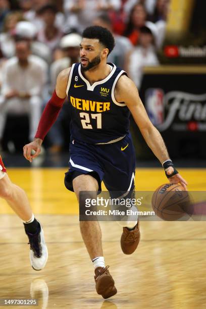 Jamal Murray of the Denver Nuggets dribbles during the second quarter against the Miami Heat in Game Four of the 2023 NBA Finals at Kaseya Center on...
