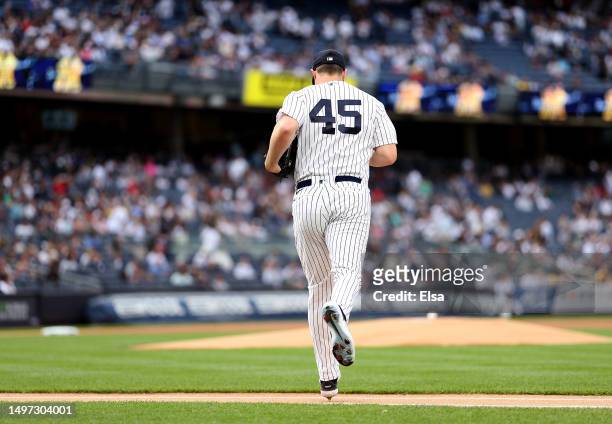 Gerrit Cole of the New York Yankees heads to the pitcher's mound to start the game against the Boston Red Sox at Yankee Stadium on June 9, 2023 in...