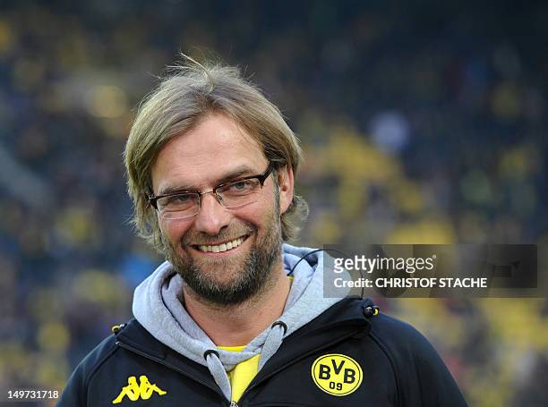 Dortmund's headcoach Juergen Klopp laughs during the German first division Bundesliga football match Borussia Dortmund vs FC Bayern Munich in the...