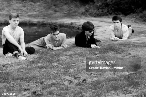 English alternative rock band, The Smiths, Dunham Massey, Greater Manchester, 7th September 1983. Left to right: bassist Andy Rourke, singer...