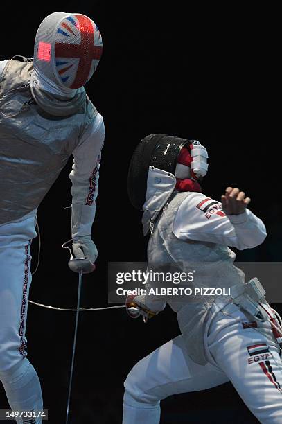 Britain's Anna Bentley fences against Egypt's Rana El Husseiny during the women's foil team session as part of the fencing event of London 2012...